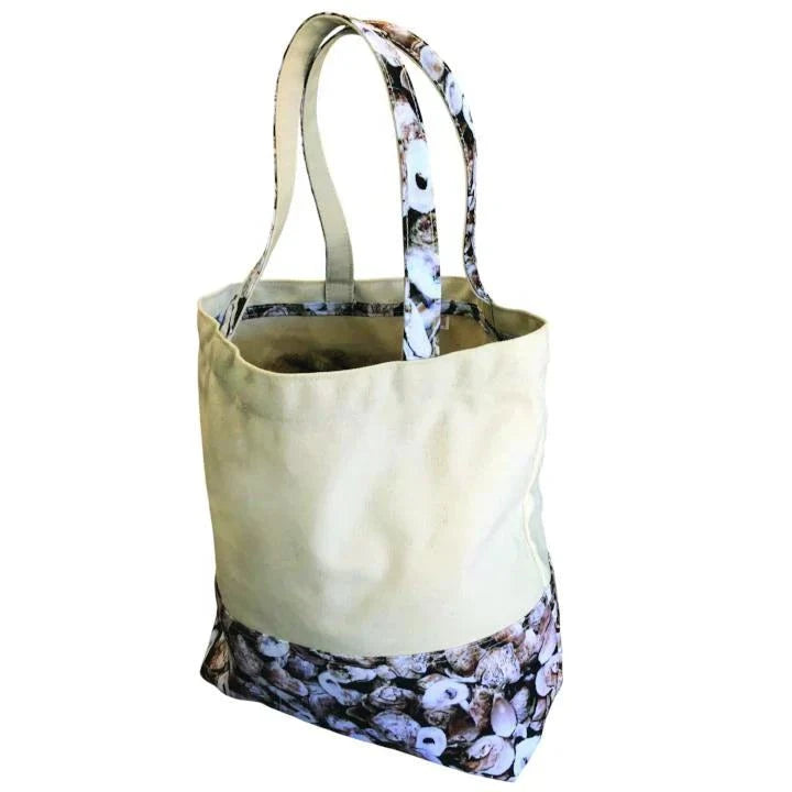 Charleston Oyster Canvas Tote Bag with Oystaflage pattern accents and durable cotton body.