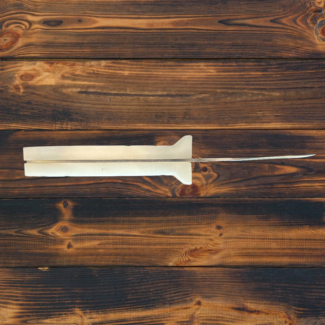 Ultimate oyster and shellfish knife with stainless steel blade and ergonomic Delrin handle on wooden surface